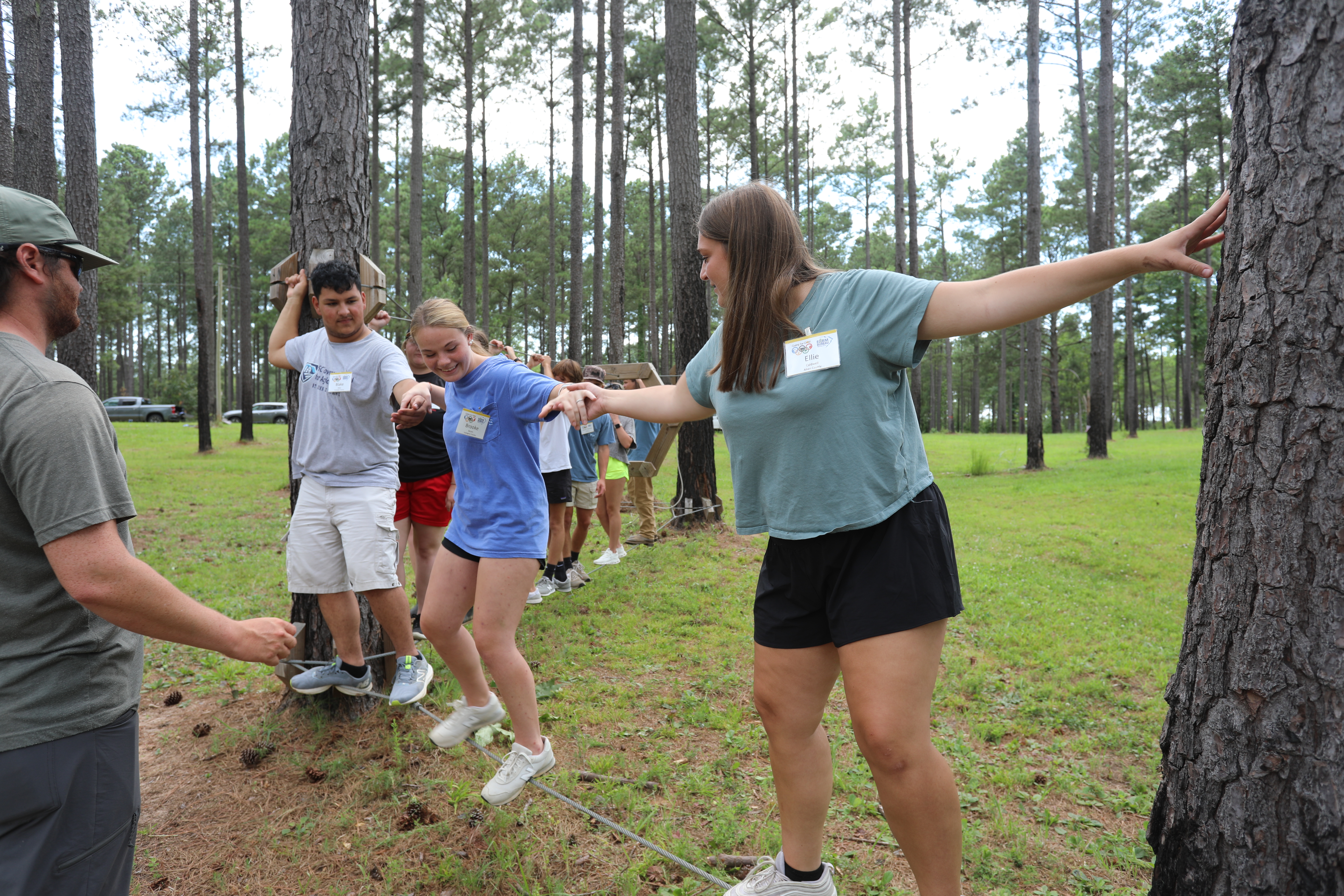 Low ropes course team building activity at YLC